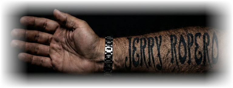 Jerry Ropero forearm tattoo logo